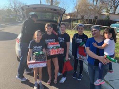 IMPACT gives back Christmas event